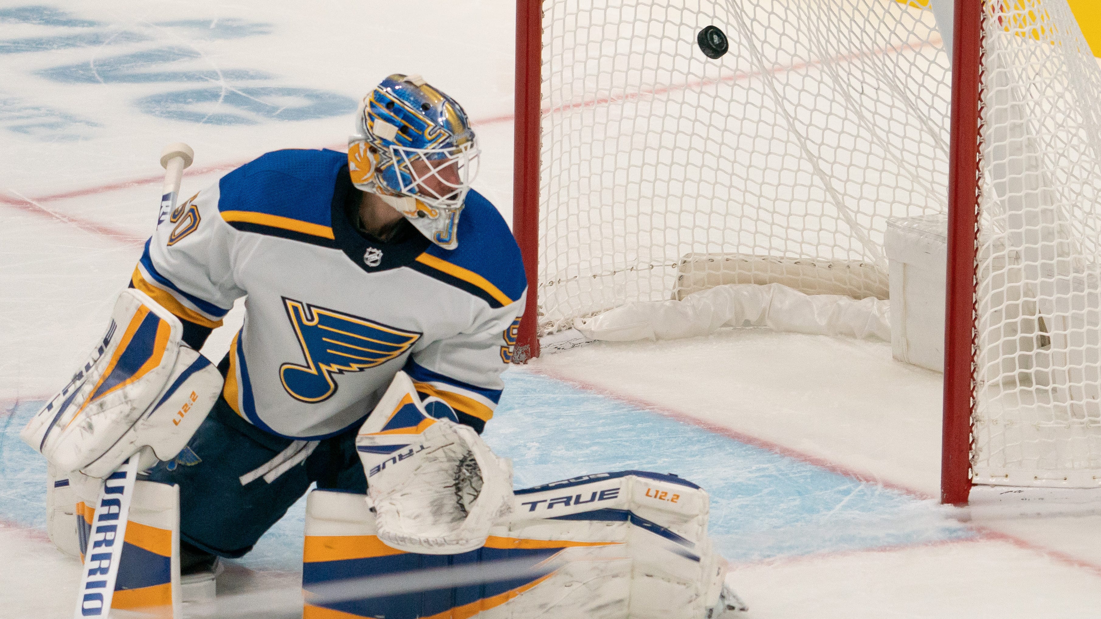 WATCH: Blues' Jordan Binnington hits 3 Sharks players after being pulled from game