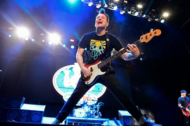 Mark Hoppus of Blink-182 performs during the second and final day of Warped Tour.