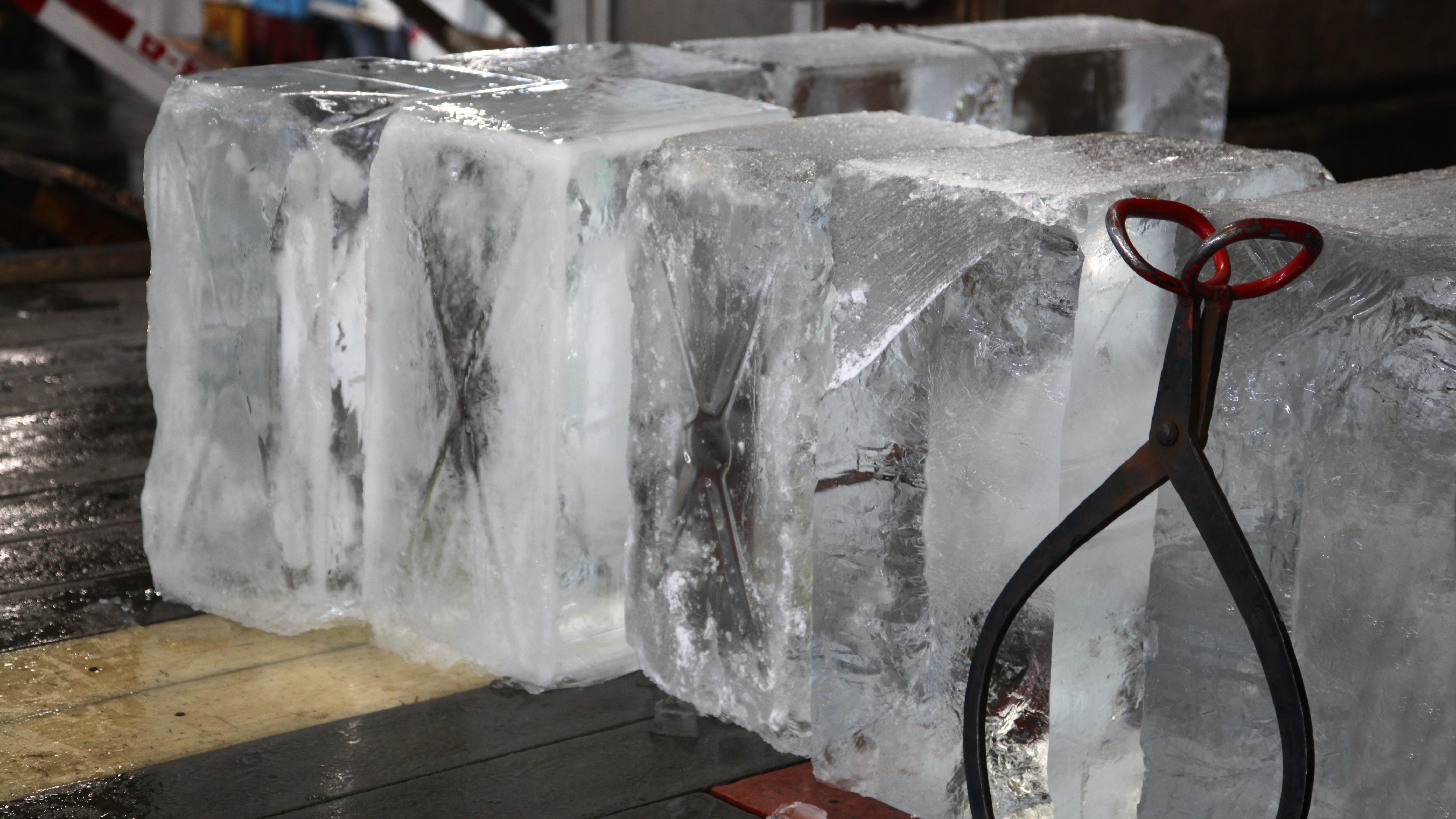 Blocks of ice are selling like – what else? – hotcakes at Pilsen business