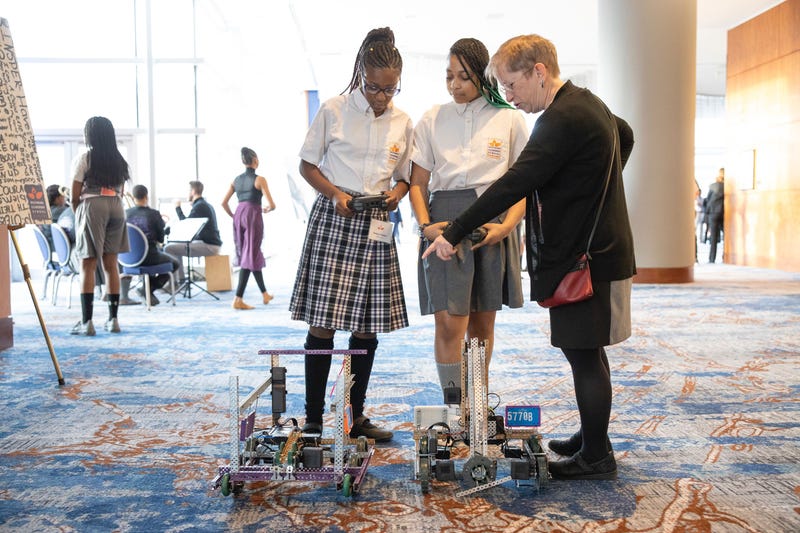 Young Women Learn To Build A Robot