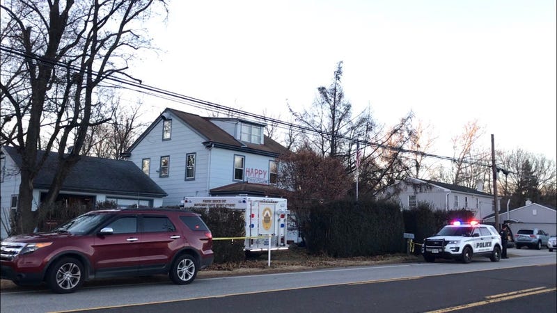 Authorities are investigating the scene of a home in Montgomery County where two bodies were found in the front yard.