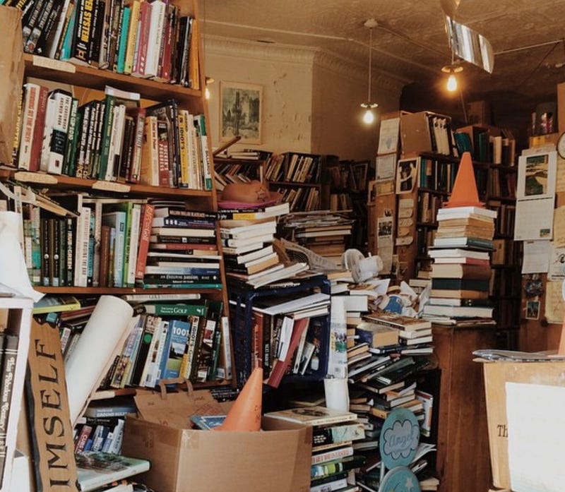 Books cluttered and stacked in store