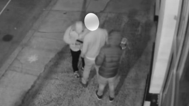 Two men approach Milan Loncar as he walks his dog, moments before he is shot dead.