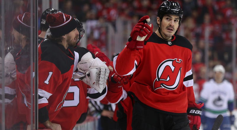 Dec 31, 2018; Newark, NJ, USA; New Jersey Devils center Brian Boyle (11) points to the stands after a scoring a goal during the first period of their game against the Vancouver Canucks at Prudential Center. Mandatory Credit: Ed Mulholland-USA TODAY Sports