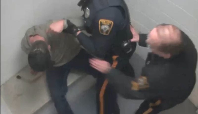 Screen capture from video showing Brian Riling being shot during a struggle at the New Hope police station.
