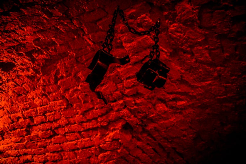 cuffs hanging in dungeon