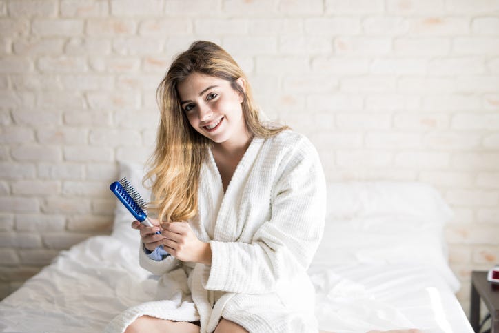 brush hair in bed