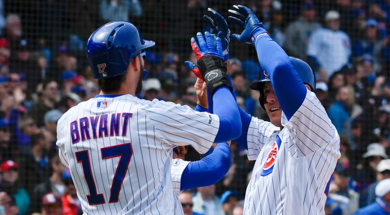 Anthony Rizzo, right, is congratulated by Cubs teammate Kris Bryant after homering.
