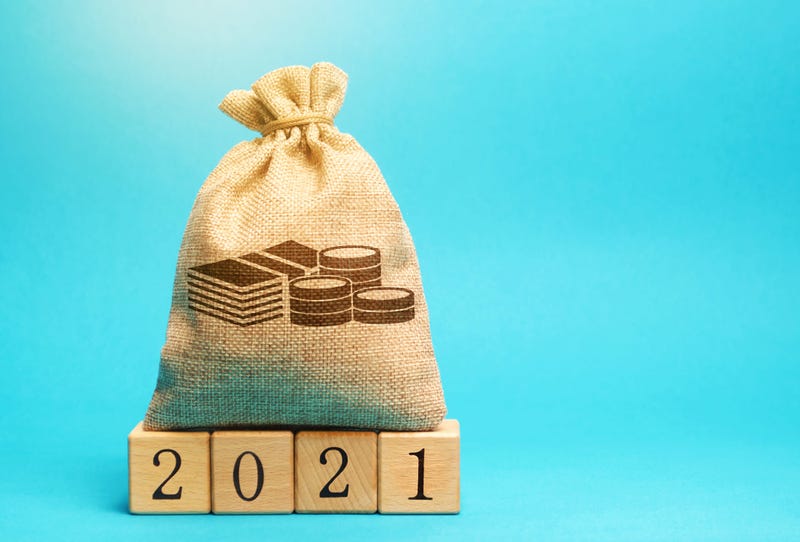 Money bag and wooden blocks 2021