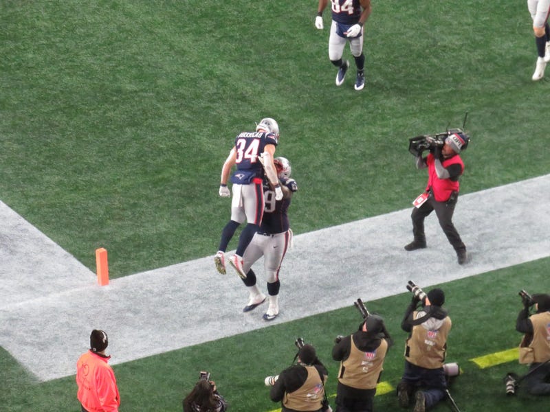 Patriots RB Rex Burkhead gets a lift from RG Shaq Mason after the game winning TD vs. Bills, 12/21/19