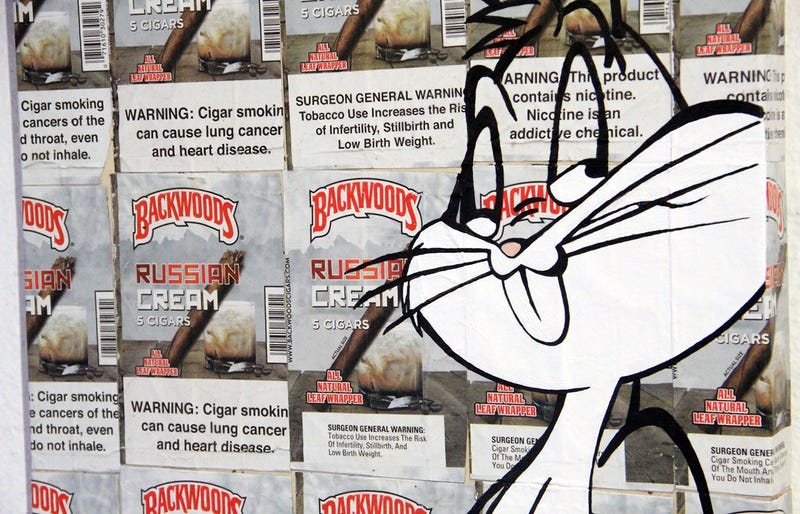 Art of Bugs Bunny painted over Backwoods wrappers at the TRAP CHAPEL pop-up art gallery in Atlanta