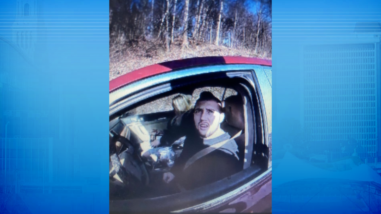 Troy Burgess, 25, in a red vehicle