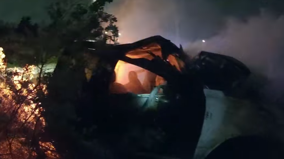Body cam video shows Garland police rescue of man from a burning car