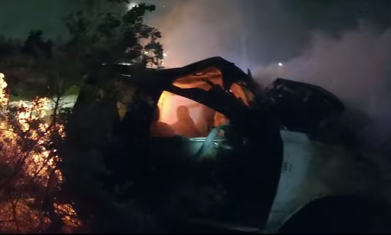 Garland Police save man from burning car