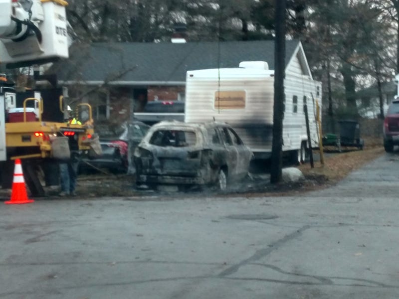 Car destroyed by downed power line
