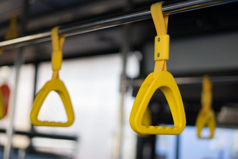 Handles on a public bus used by standing passengers
