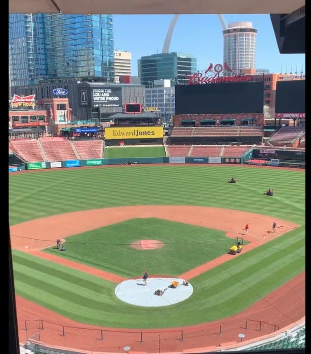 Mowing the arch into the new grass turf at Busch Stadium.