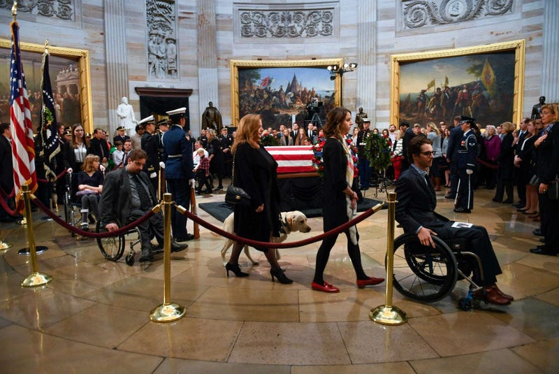 President George H.W. Bush lies in state at the U.S. Capitol Rotunda. 