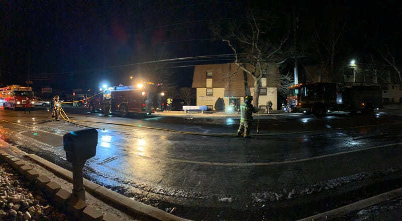 A three-alarm fire at the Buttonwood Village Apartments in Blackwood, N.J.,forced neighbors to knock on doors and windows to get everyone out to safety.