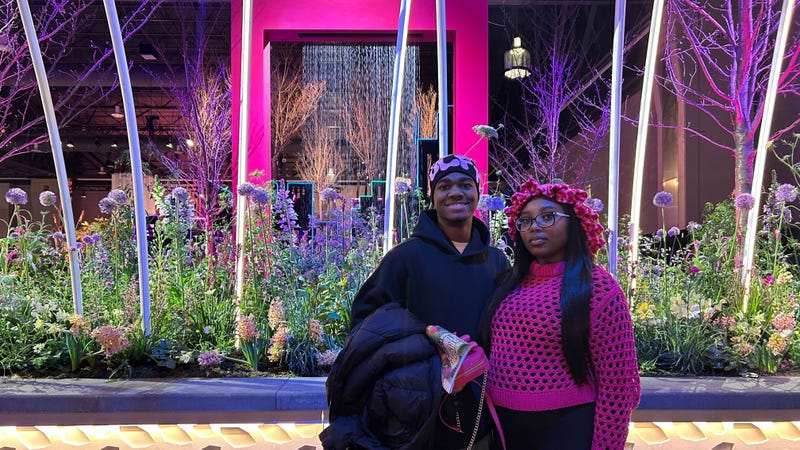 Joshua Herard and Eleanor Koepke-Heisler say the floral aroma is the best part of walking in to the Philadelphia Flower Show..