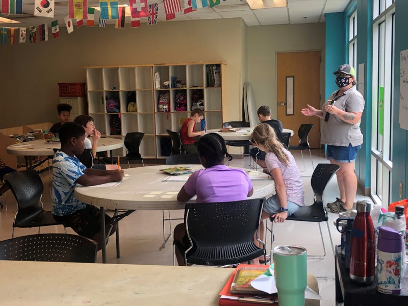 Caine Halter Family YMCA - Counselor engaging students in academic support - Amanda Long, Hughes Agency
