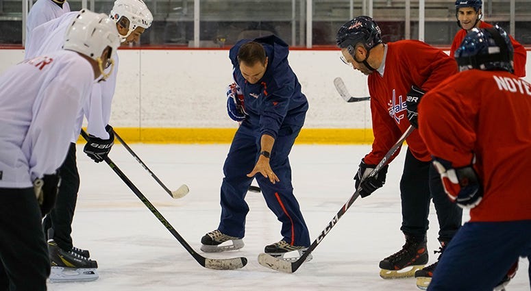 Sports Junkies host John 'Cakes' Auville takes the face-off in the 2019 Capitals Media Fantasy Camp