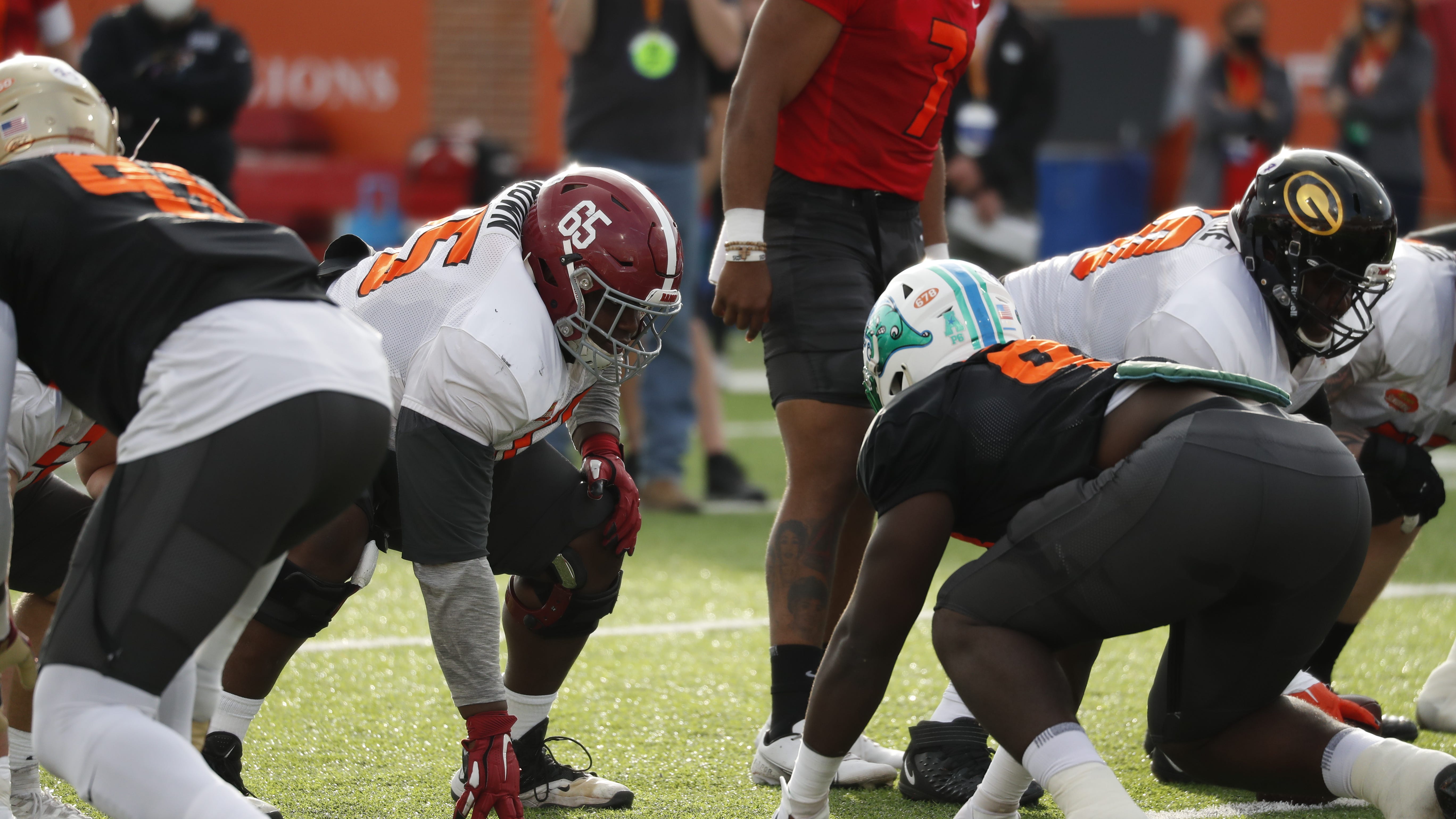Saints DL coach puts Tulane's Cam Sample through drills at Green Wave Pro Day