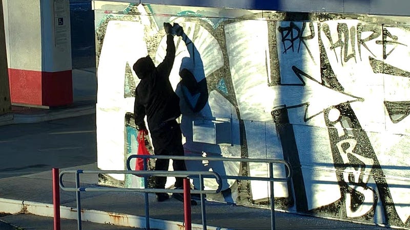 Donald Park III of Cherry Hill is caught on video spray-painting graffiti onto an abandoned gas station in Camden.