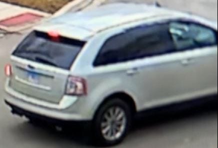 silver car in surveillance photo