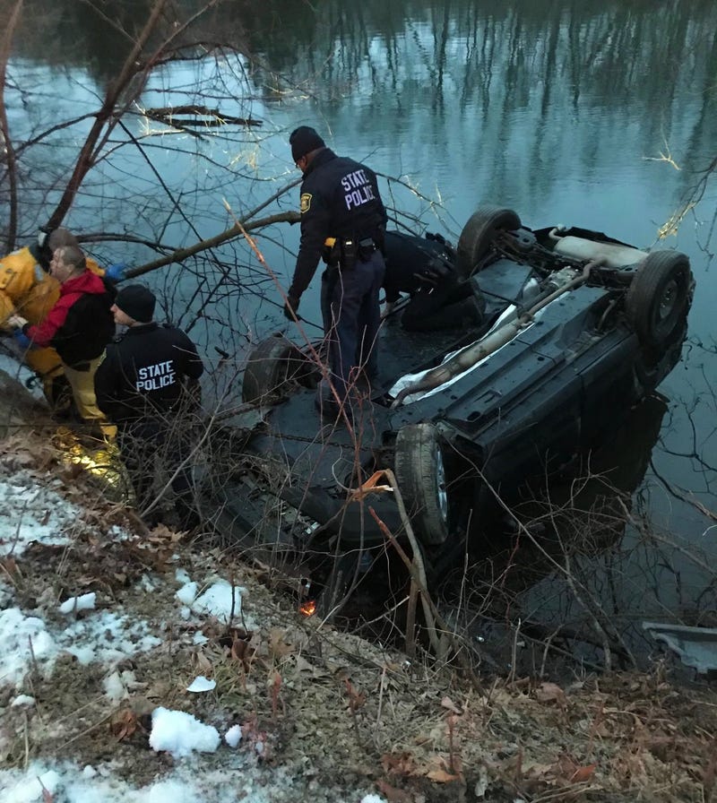 car goes into river when woman swerves for deer