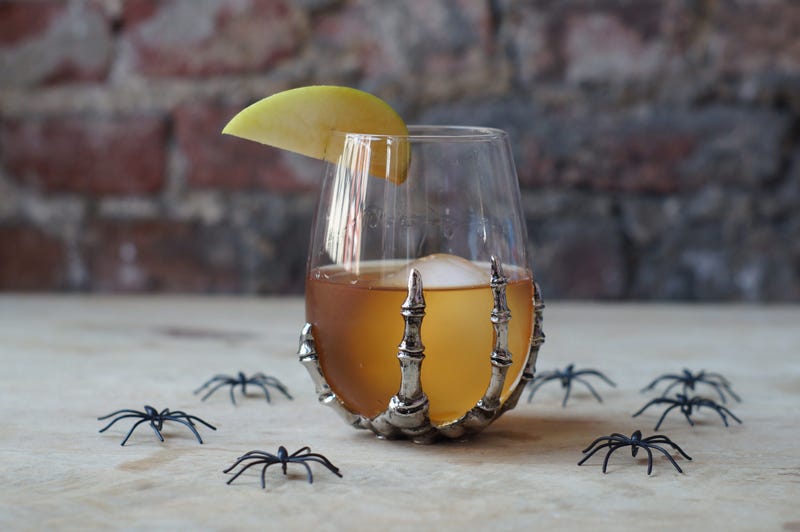 A seasonally appropriate caramel apple Old Fashioned, with some creepy crawlers to boot