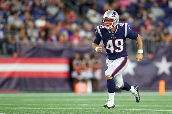 Joe Cardona runs down field with the Patriots special teams.