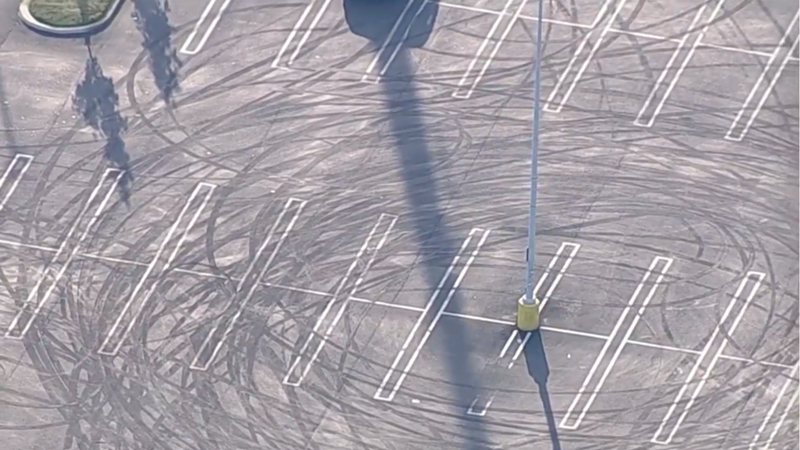 Tire tracks left in a parking lot after an illegal car meet-up in Northeast Philadelphia on June 2, 2024. 