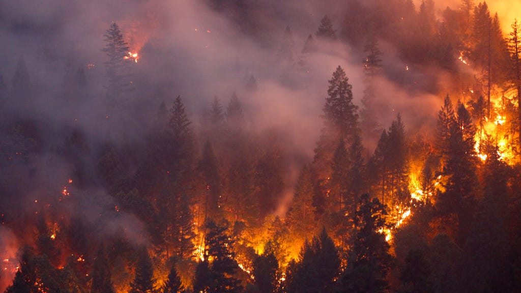Woman charged with arson in California wildfire
