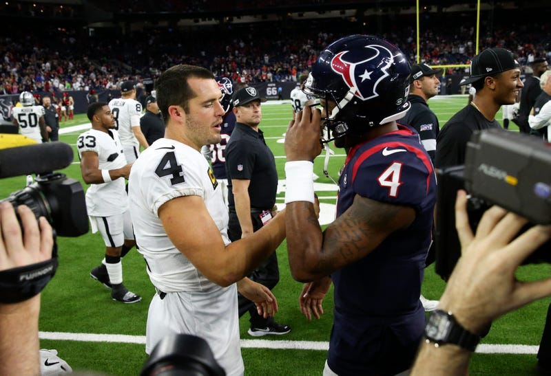 Derek Carr greets with Deshaun Watson after a game. 