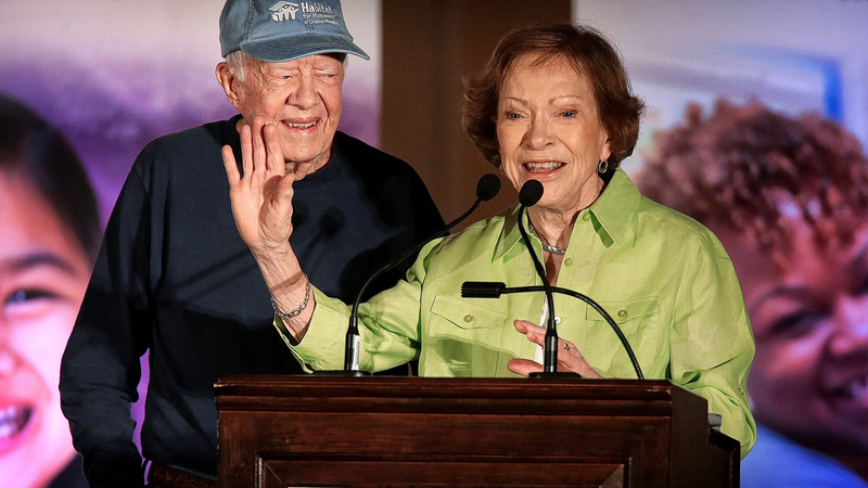 Former President Jimmy Carter and First Lady Rosalynn Carter talk to Habitat For Humanity volunteers and community leaders during a launch party for the Carter Work Project at the Peabody Hotel in Memphis Aug. 21, 2016.