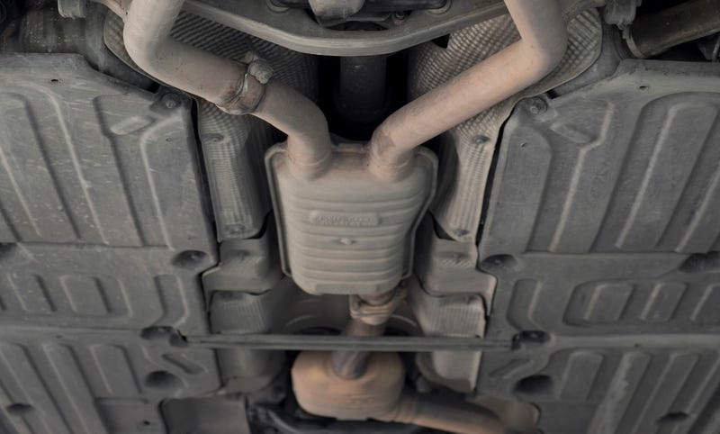 exhaust pipes under a car