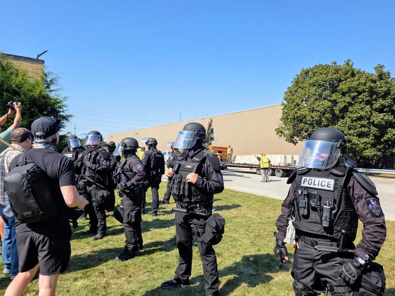 Suburban police patrol Broadview ICE facility 