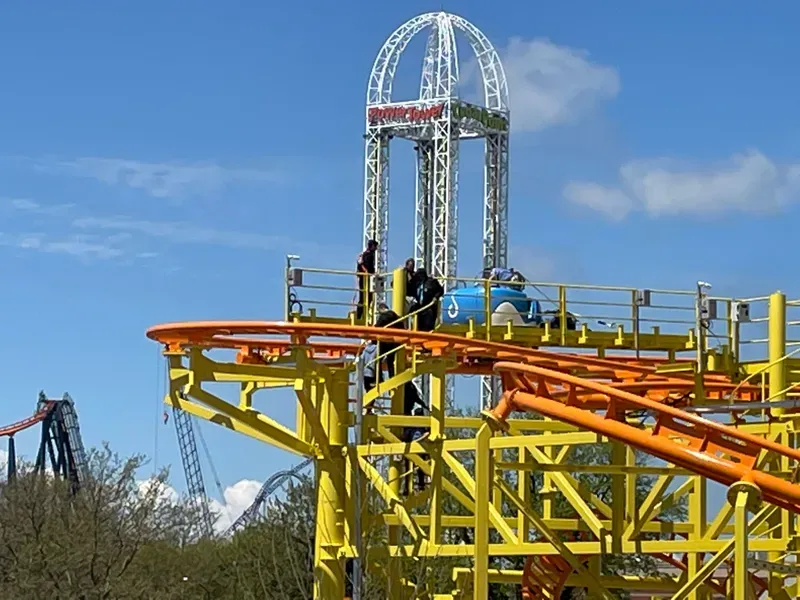 In this 2023 photo, passengers on Cedar Point's Wild Mouse had to be escorted off the ride after it abruptly stopped mid cycle. Power Tower is seen in the background.