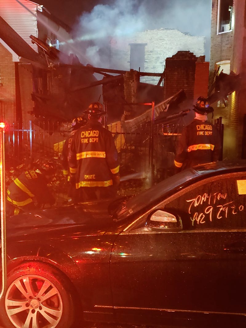 A vacant home collapsed and two other buildings were damaged in an extra-alarm fire Oct. 11, 2020, in the 800 block of North Lawndale Avenue.