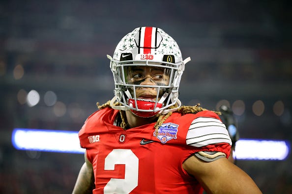 Chase Young of Ohio State looks on. 