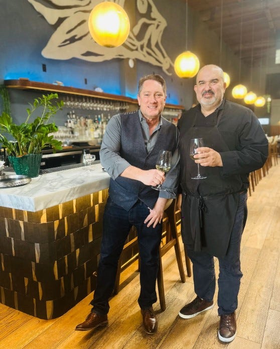 Liam Mayclem with Chef Omer Artung