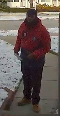 suspect photo, red coat