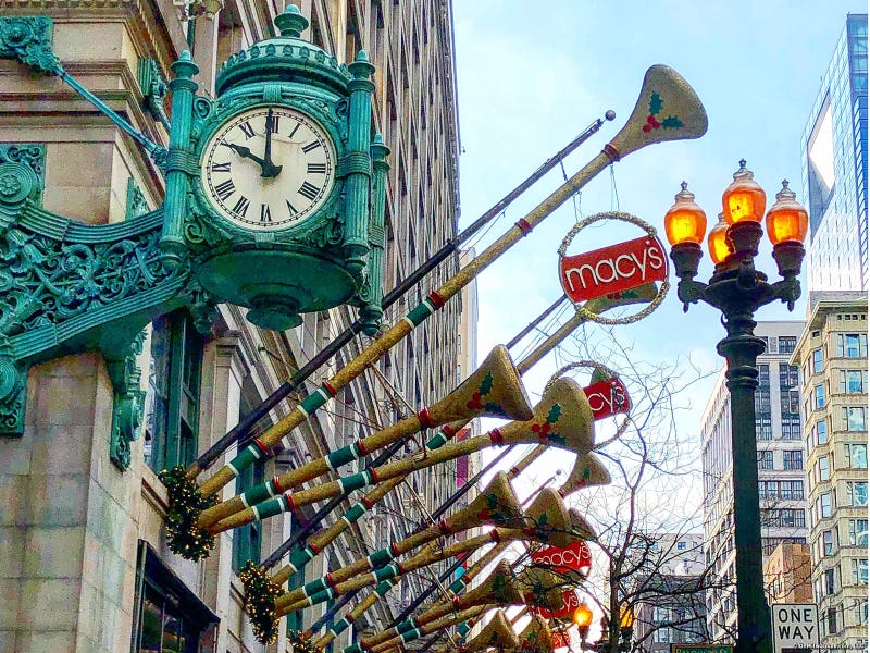 The famous clock on the wall outside Macy's on State Street in Chicago
