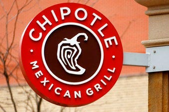 FILE - This Jan. 12, 2017, file photo shows the sign on a Chipotle restaurant in Pittsburgh. (AP Photo/Gene J. Puskar, File)
