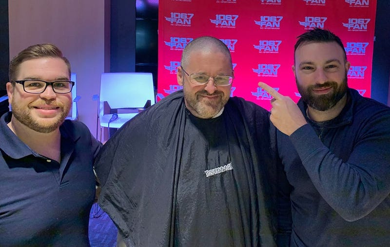 WJFK-FM’s Chris Russell with Danny Rouhier and Grant Paulsen. Russell lost a bet and then lost his hair on the air on Thursday, December 12. 