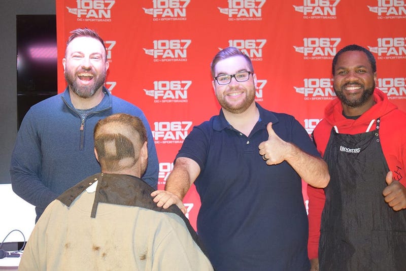 WJFK-FM’s Chris Russell with Danny Rouhier and Grant Paulsen. Russell lost a bet and then lost his hair on the air on Thursday, December 12. 