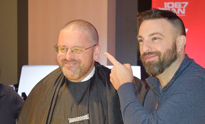 WJFK-FM’s Chris Russell with Danny Rouhier and Grant Paulsen. Russell lost a bet and then lost his hair on the air on Thursday, December 12. 
