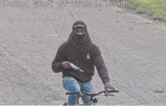 Suspect on bike wanted for questioning in church building fire