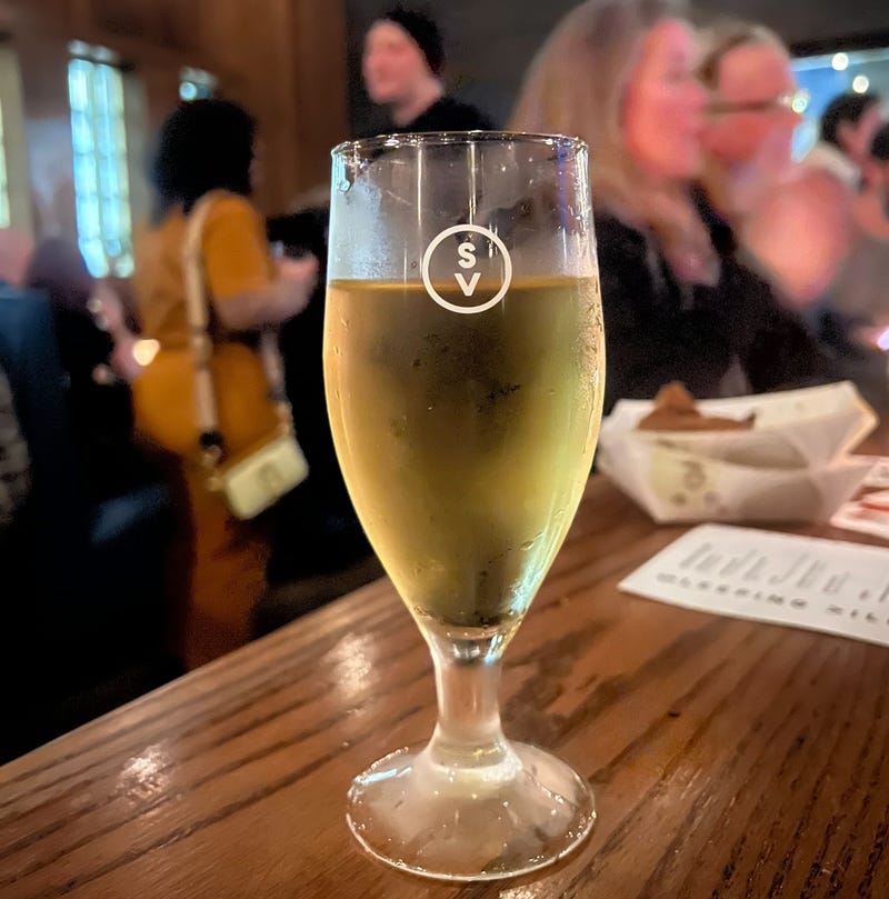 glass of cider on bar top